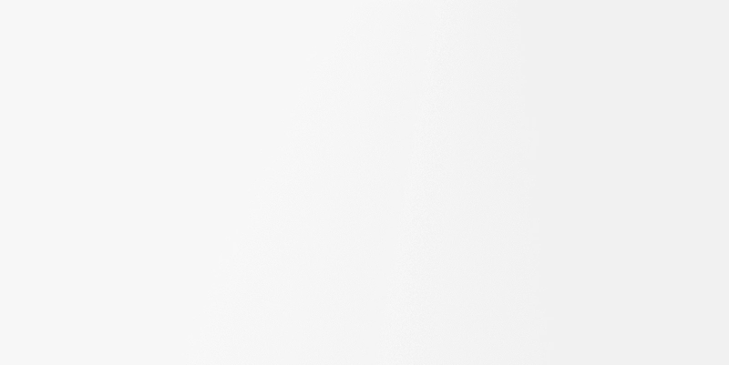 Abstract gray textured background with a subtle dotted gradient pattern forming a soft vertical shape in the center.